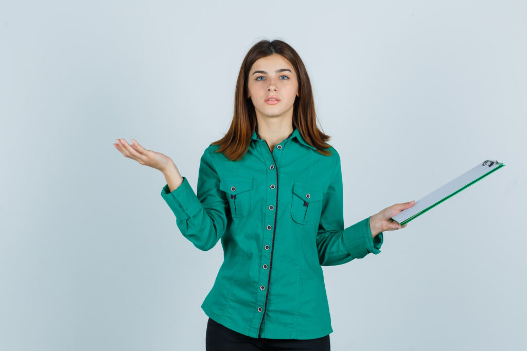 A cute woman thinking, "How Does Insurance Work?"