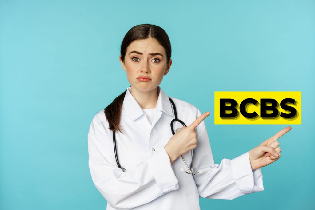 A woman doctor thinking about healthcare insurance options.